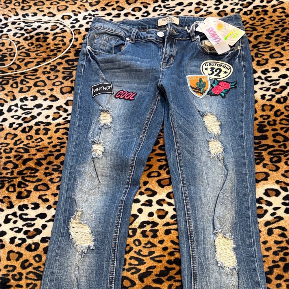 Distressed Blue Skinny Jeans with Embroidered Patch Accents